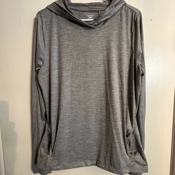 Reebok Tops - Grey Lightweight Reebok shirt with hood, front pockets, thumb holes XL